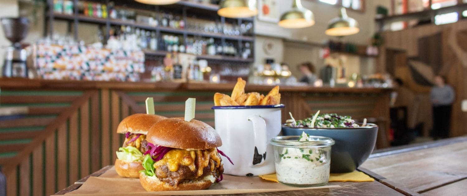 hamburgers-with-fries-cup-sauce-wooden-tray Catering Equipment